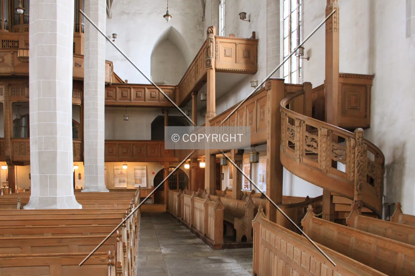 Pews and woodwork around the northwest corner