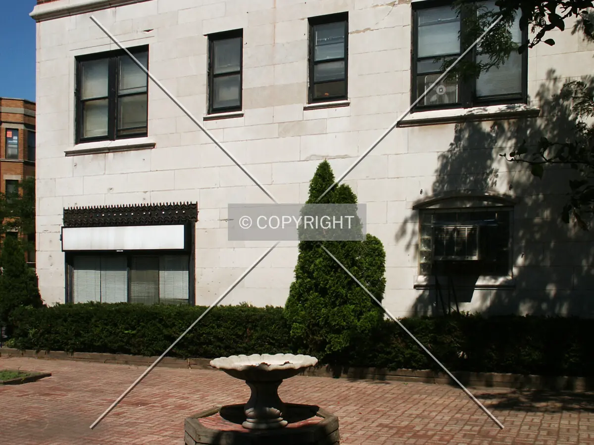 Birdbath and patio on the west side