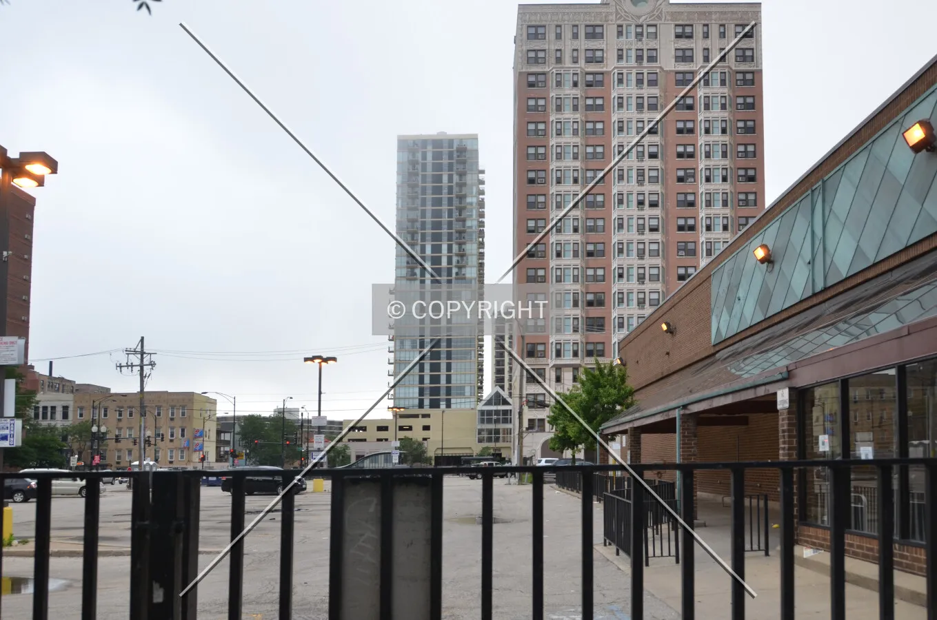 Looking west across the surface parking lot from Clark Street; June 30, 2015.