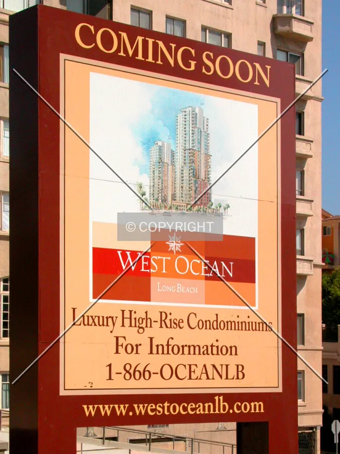Sign announcing the project with an architect's rendering