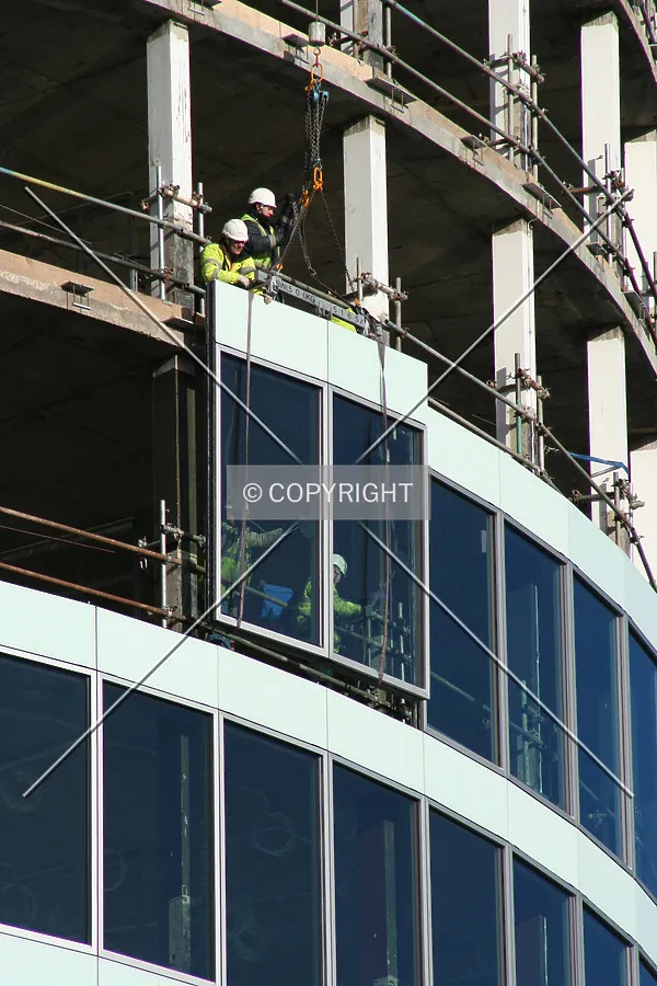 View from Smallbrook Queensway of a facade panel being inserted