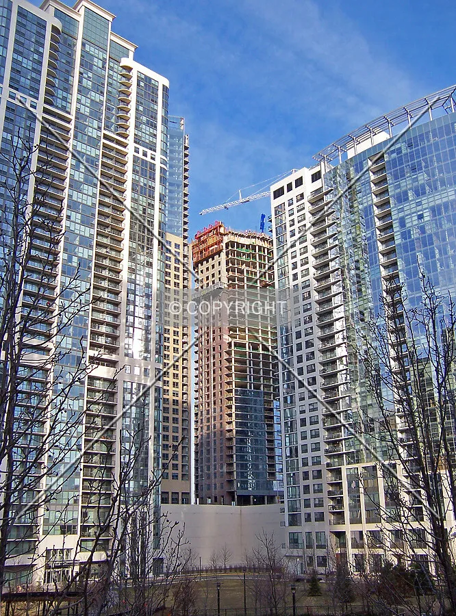 Looking northeast across Lake Shore East Park and between The Shoreham and The Lancaster