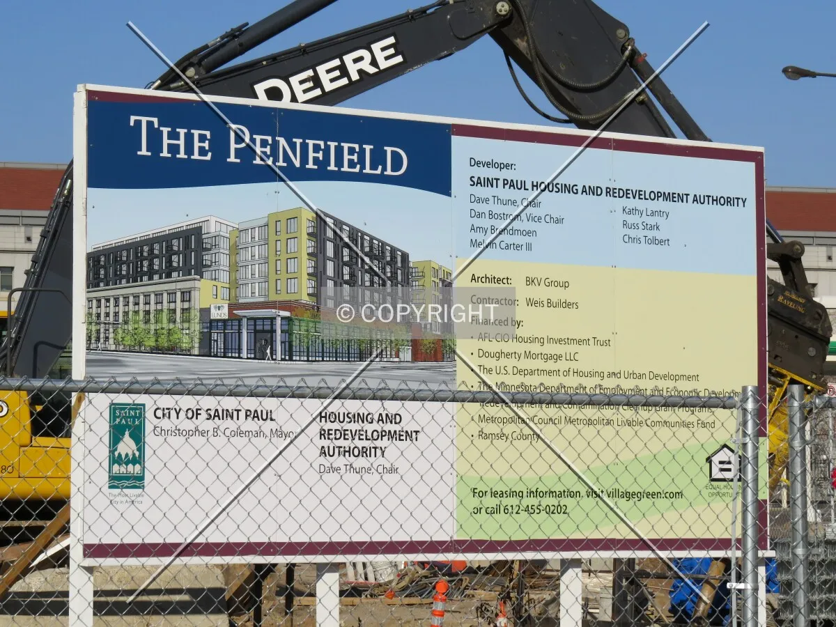 Project board along East 10th Street