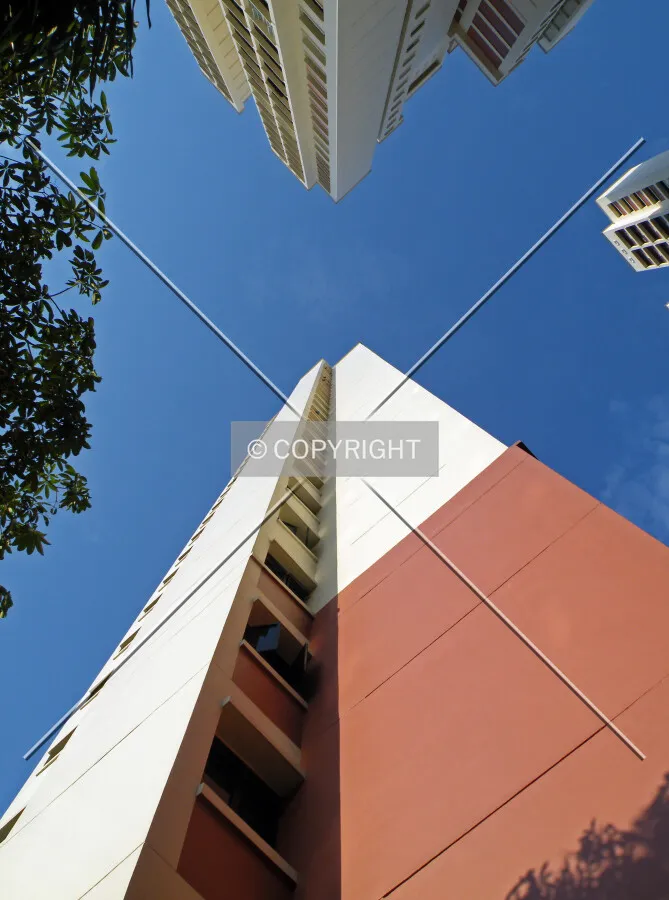 Looking up into the sky from between Block 596A and 596B