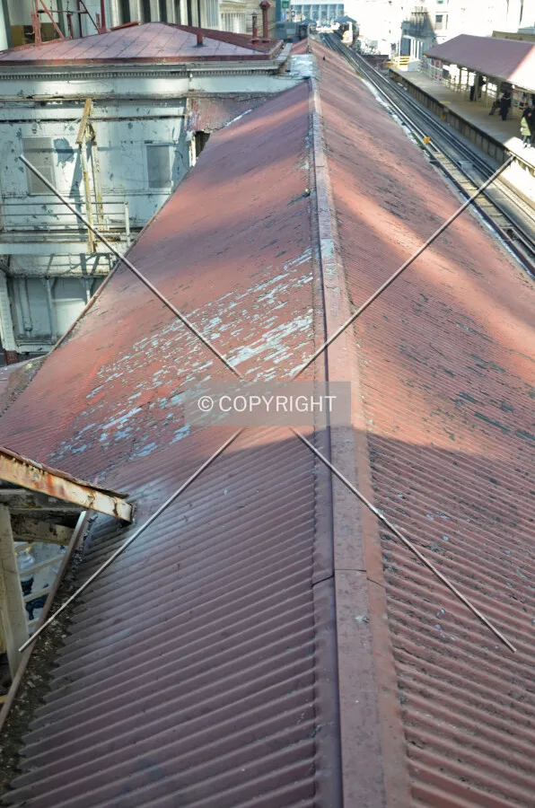 Looking north from the transfer bridge over the rooftop of the western platform canopy; March 7, 2015.