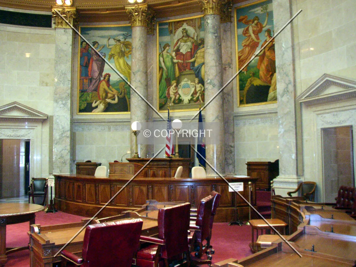 Murals and desks at the south end of the Senate Chamber