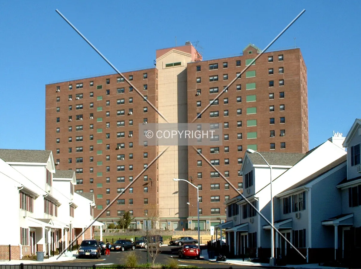 View from the southwest with new low-rise public housing in the foreground