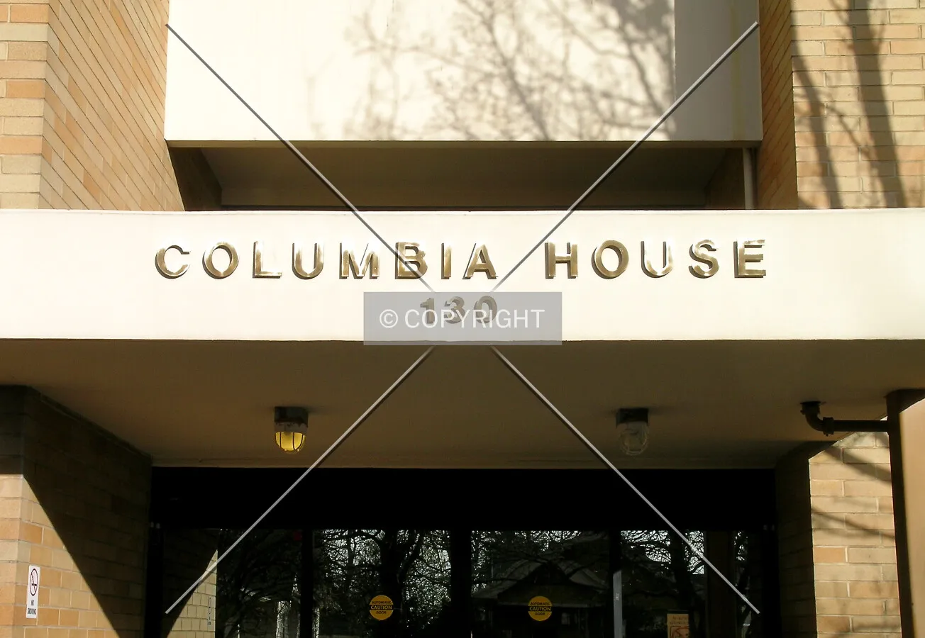 Building's address and name, above the main entrance area