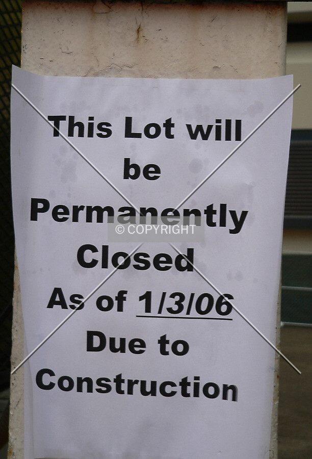 A notice of the parking lot's pending closure