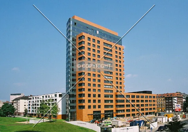 Side view from Stadttor (Flachbau on the left; tower in the middle and its addition on the right)
