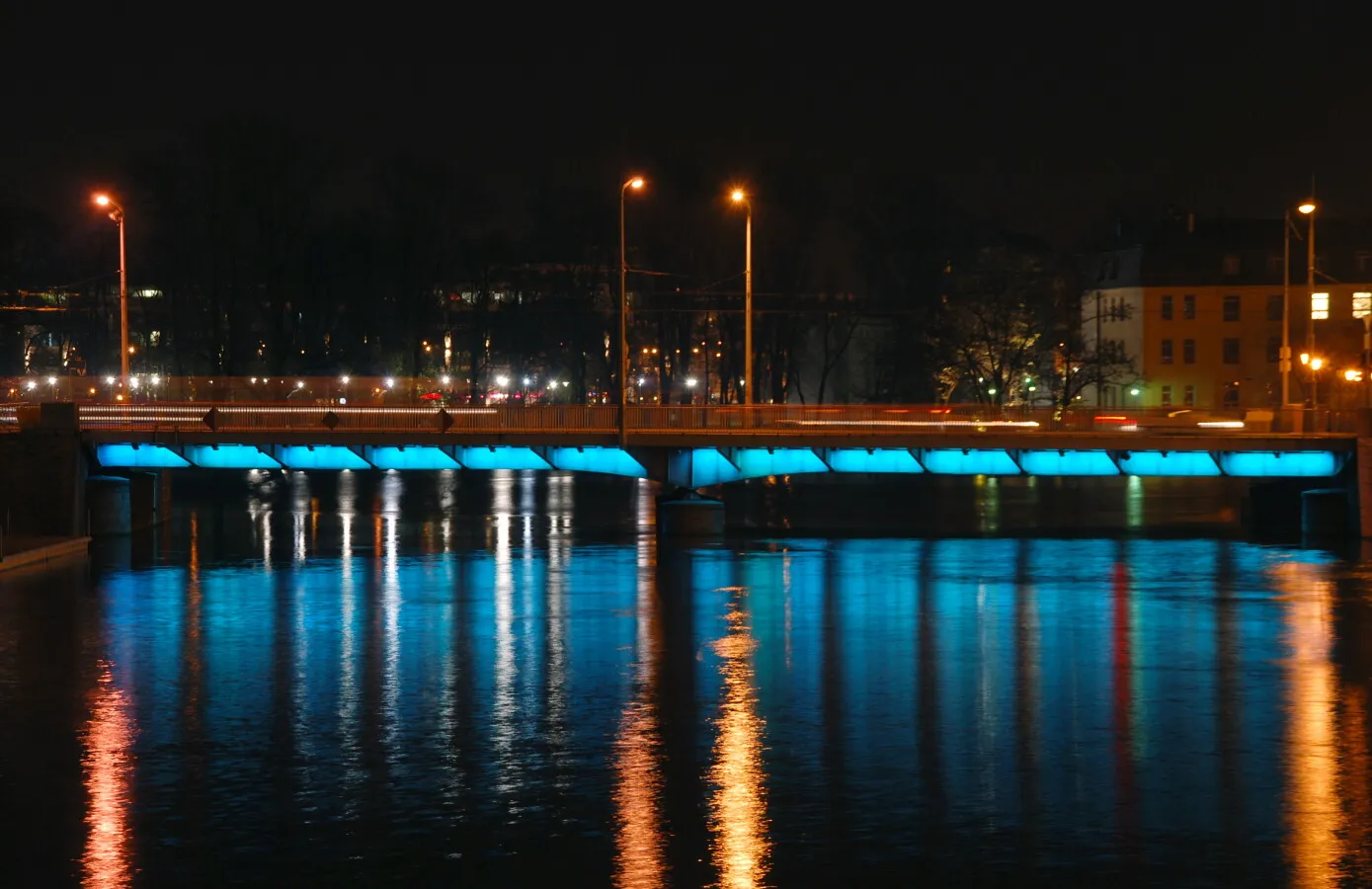 Night lighting reflecting from the Odra River
