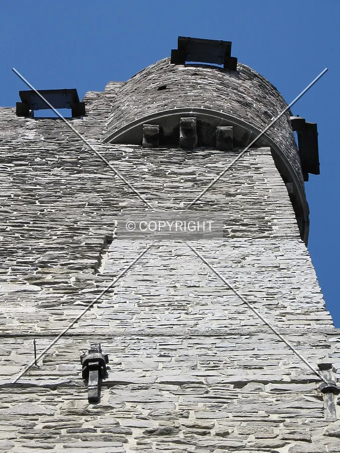 Looking up at a small guard tower on the ramparts