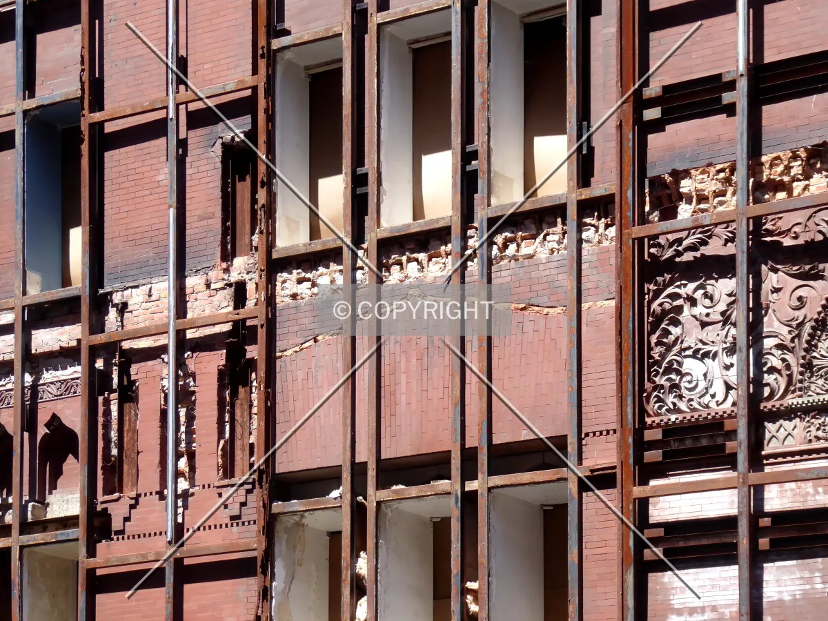 Eastern facade with remnants of a modern curtain wall present