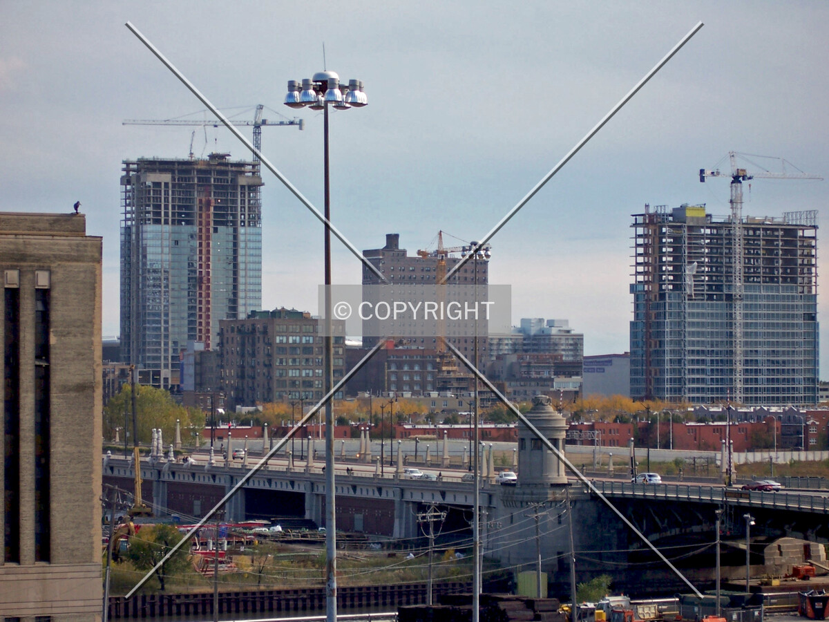 Looking southeast from the top of the parking garage at the South Gate Mall with 1400 Museum Park seen under construction on the left