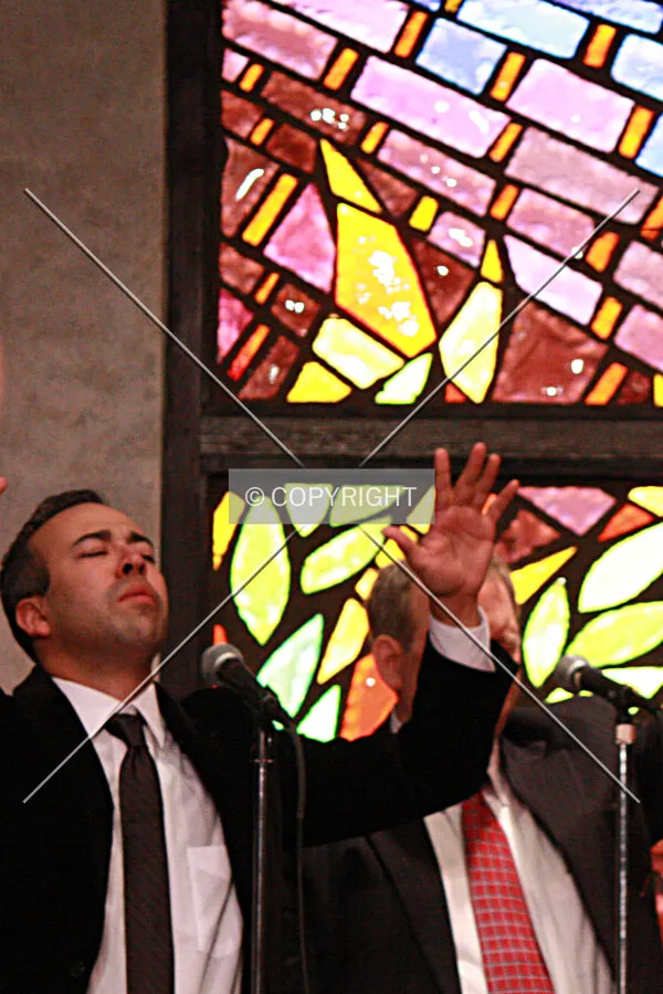 Men singing in church