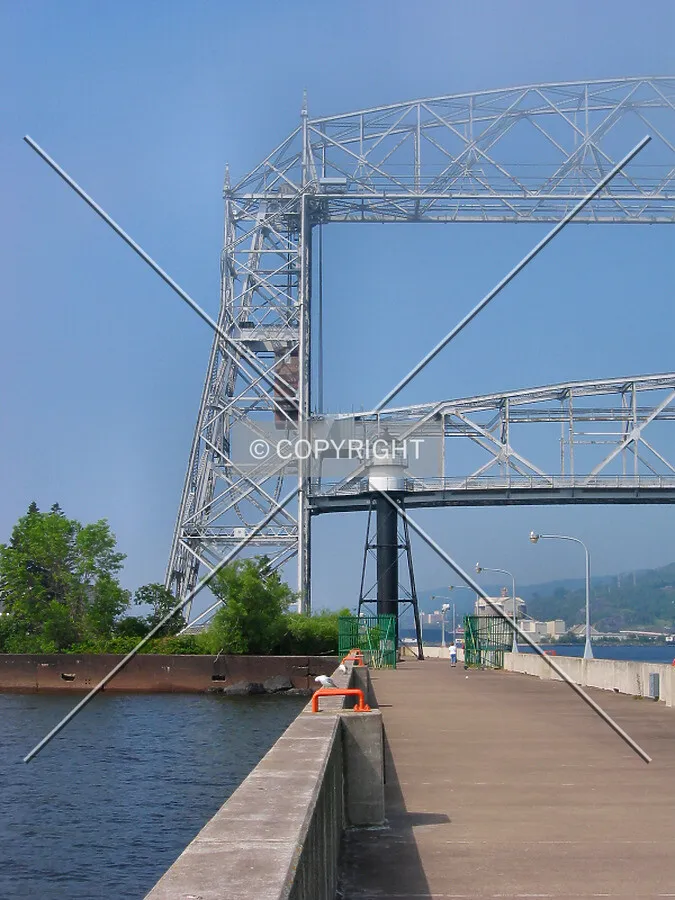 The tower and partially-raised span from the breakwater on the Minnesota Point side
