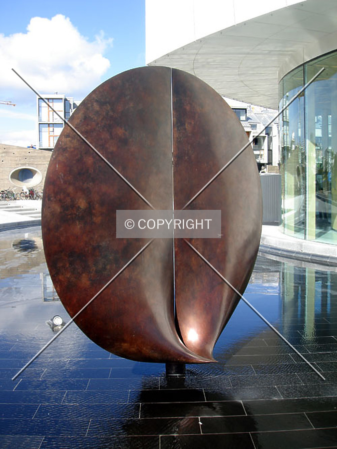 Sculpture inside the pond in front of the building