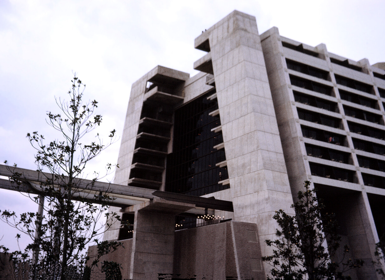 View from the northwest showing the monorail entering the building