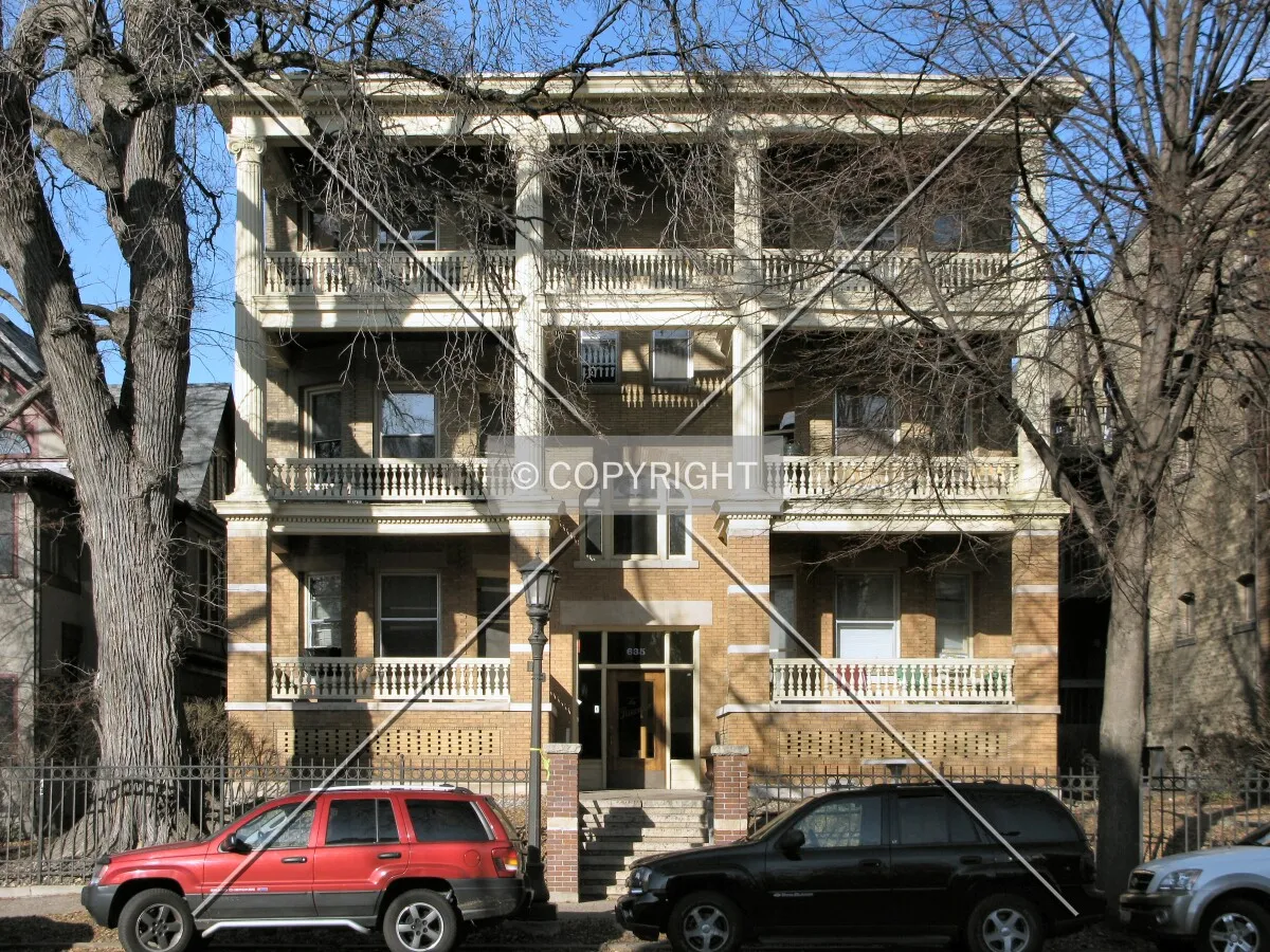 Full front elevation from across Grand Avenue