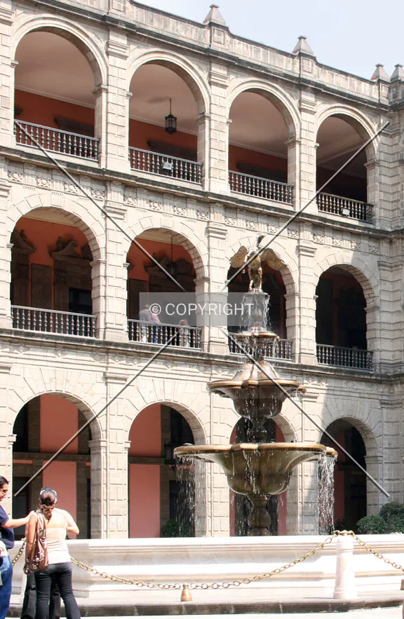 Fountain and arched balconies