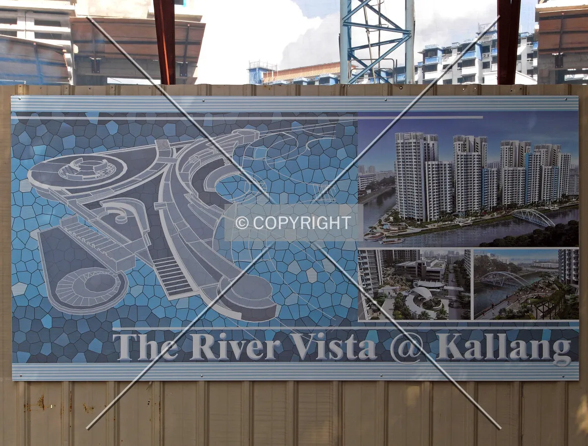 Project information displayed on the construction site fence