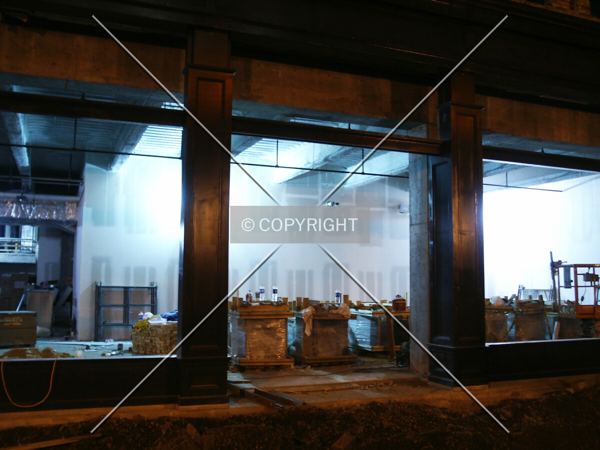 Looking into a storefront at night