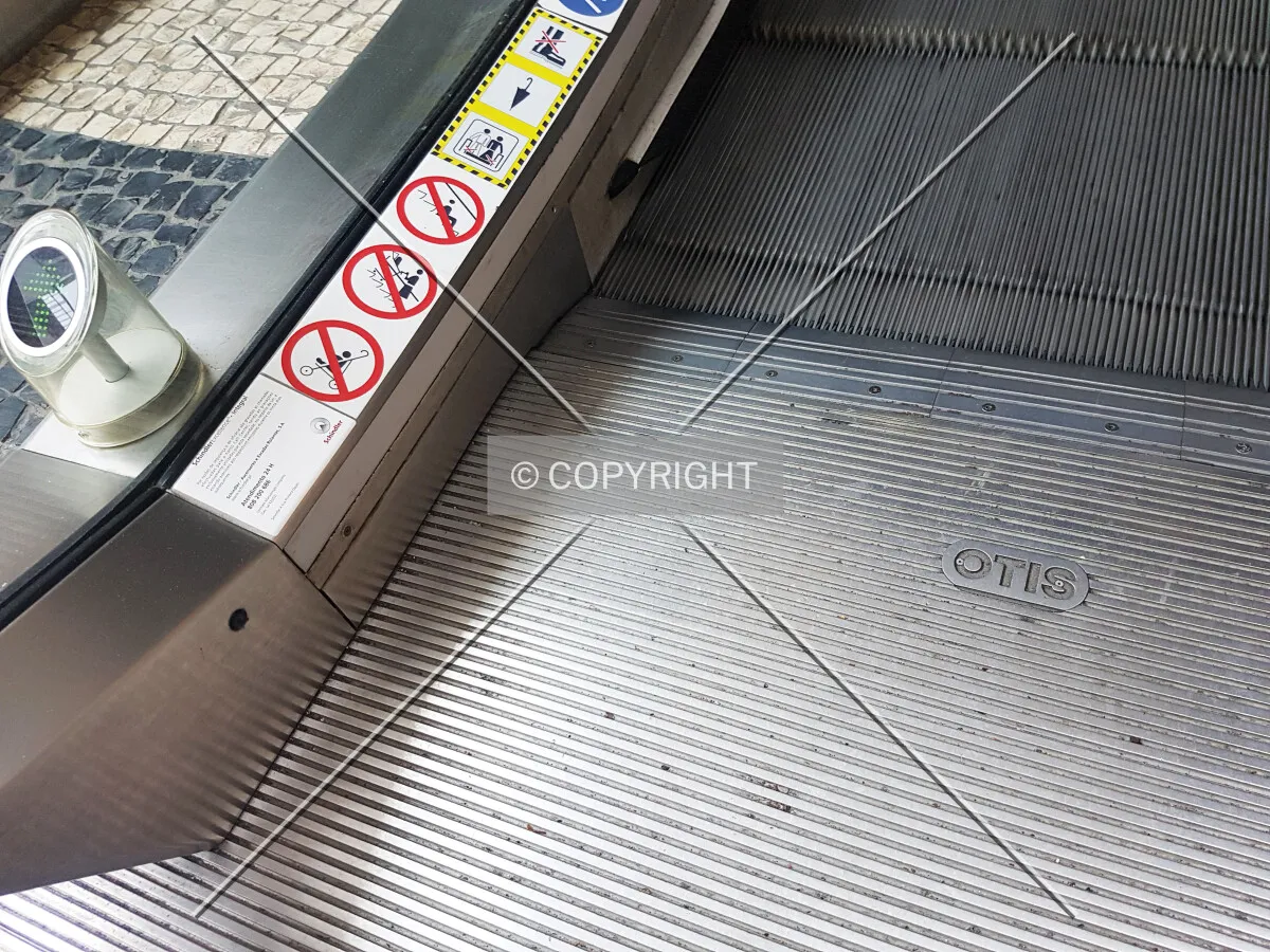 OTIS escalator maintained by Schindler Elevator