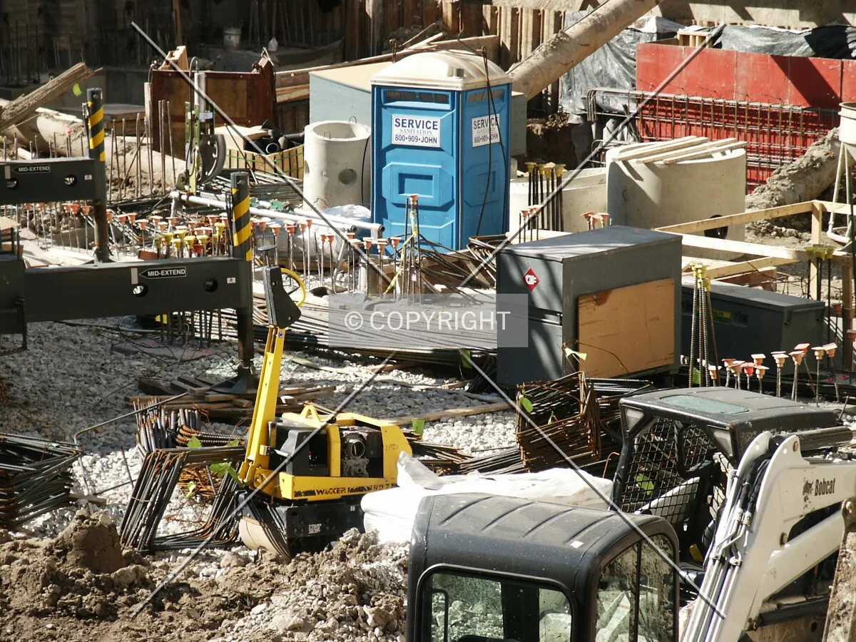Various construction-related items in the center of the site