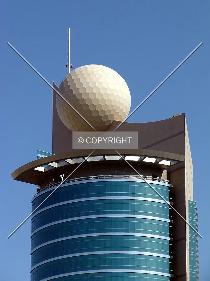 The upper floors and golfball at the top
