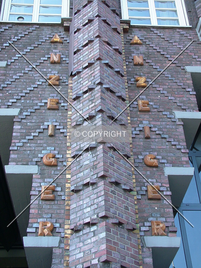 Eleven prominent columns adorn the facade from the street level to the roof