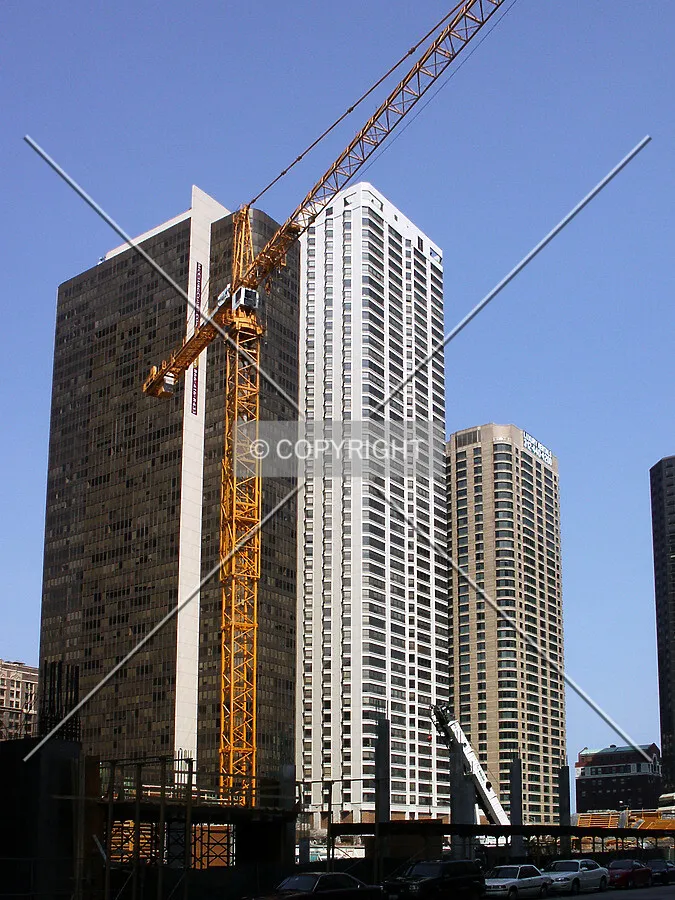 Looking up the crane from across Grand Avenue