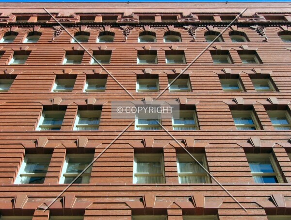 Looking up from Gravier Street