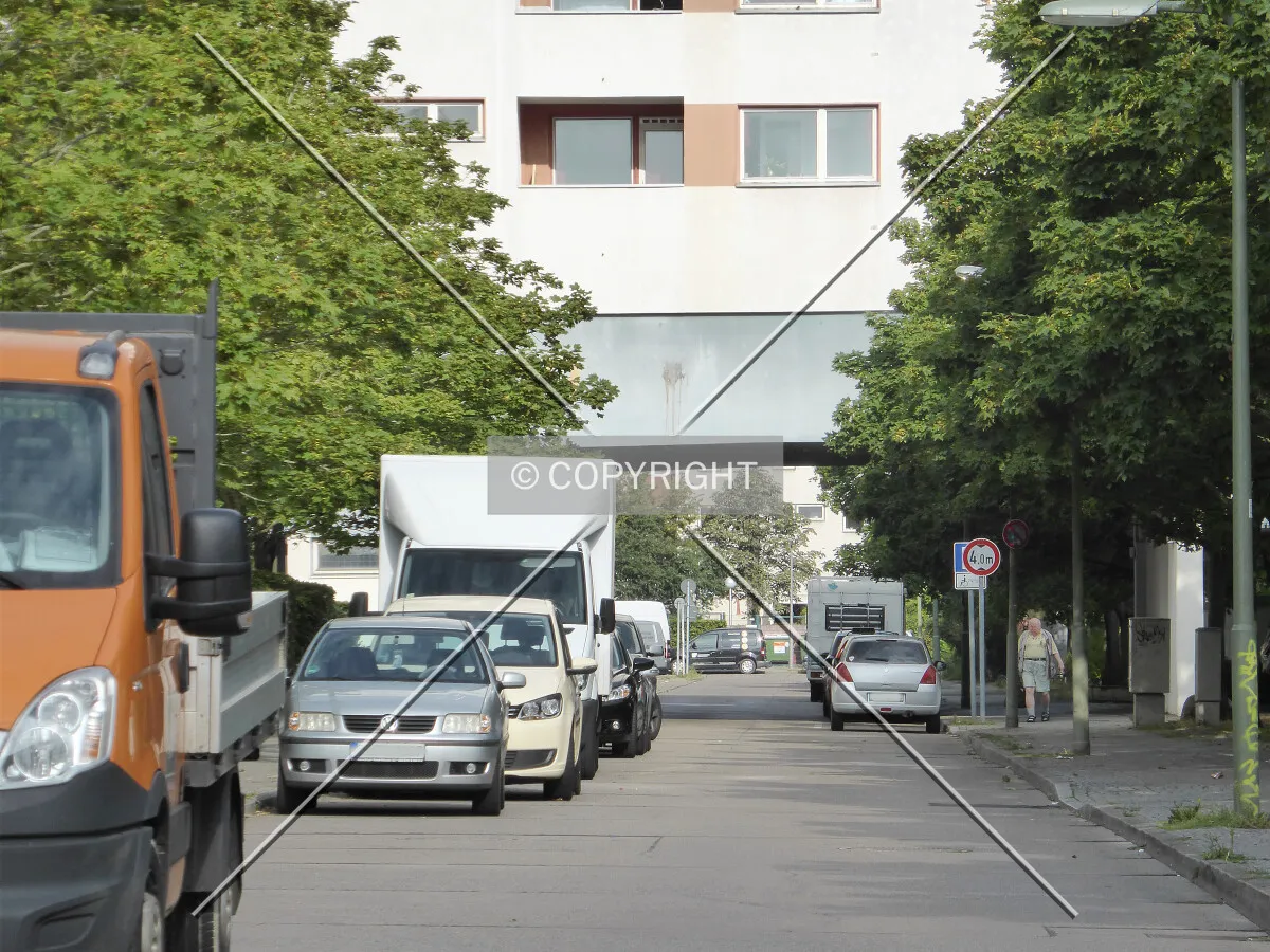 The building is spanning over the street