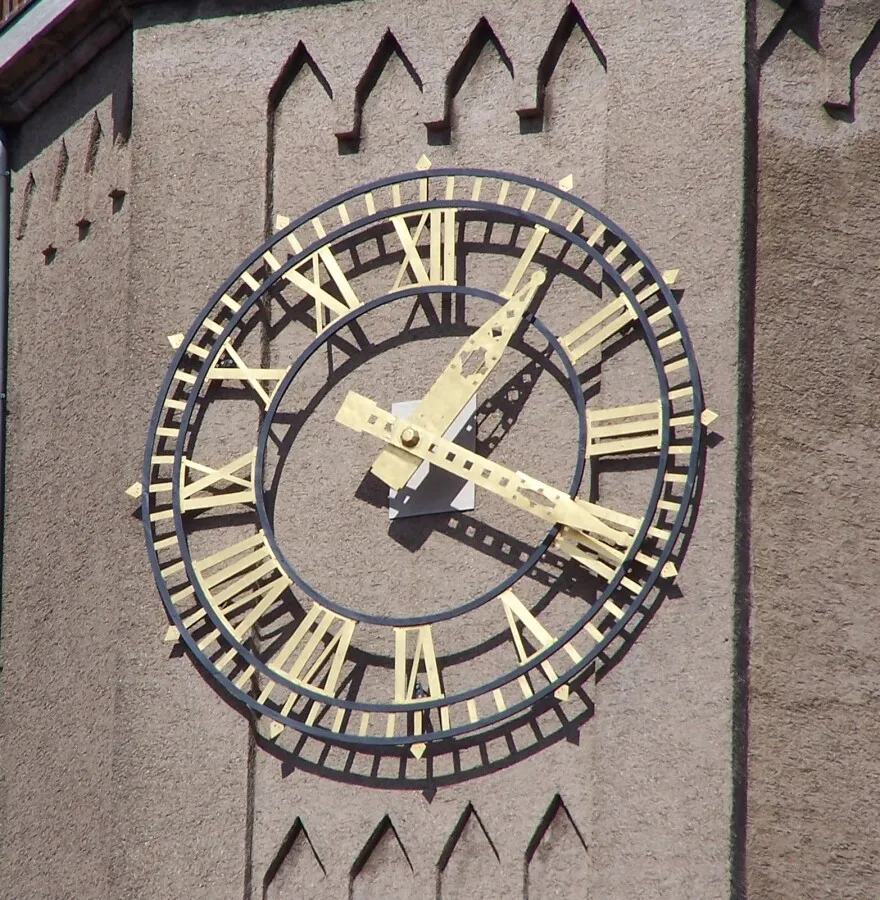The clock on the bell tower