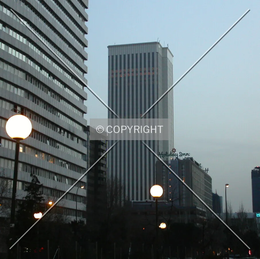 View of the building and other buildings in Azca at dusk