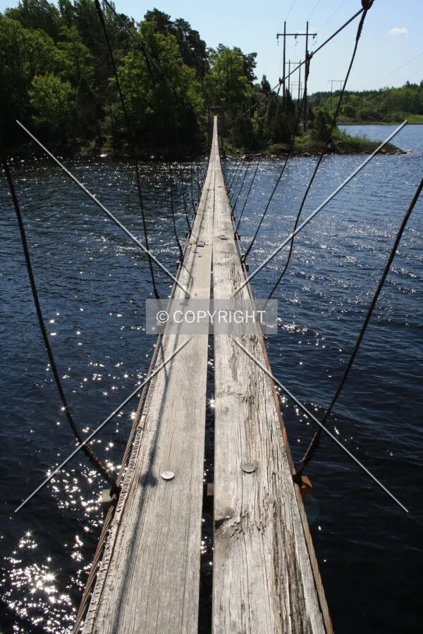 A suspension bridge over water