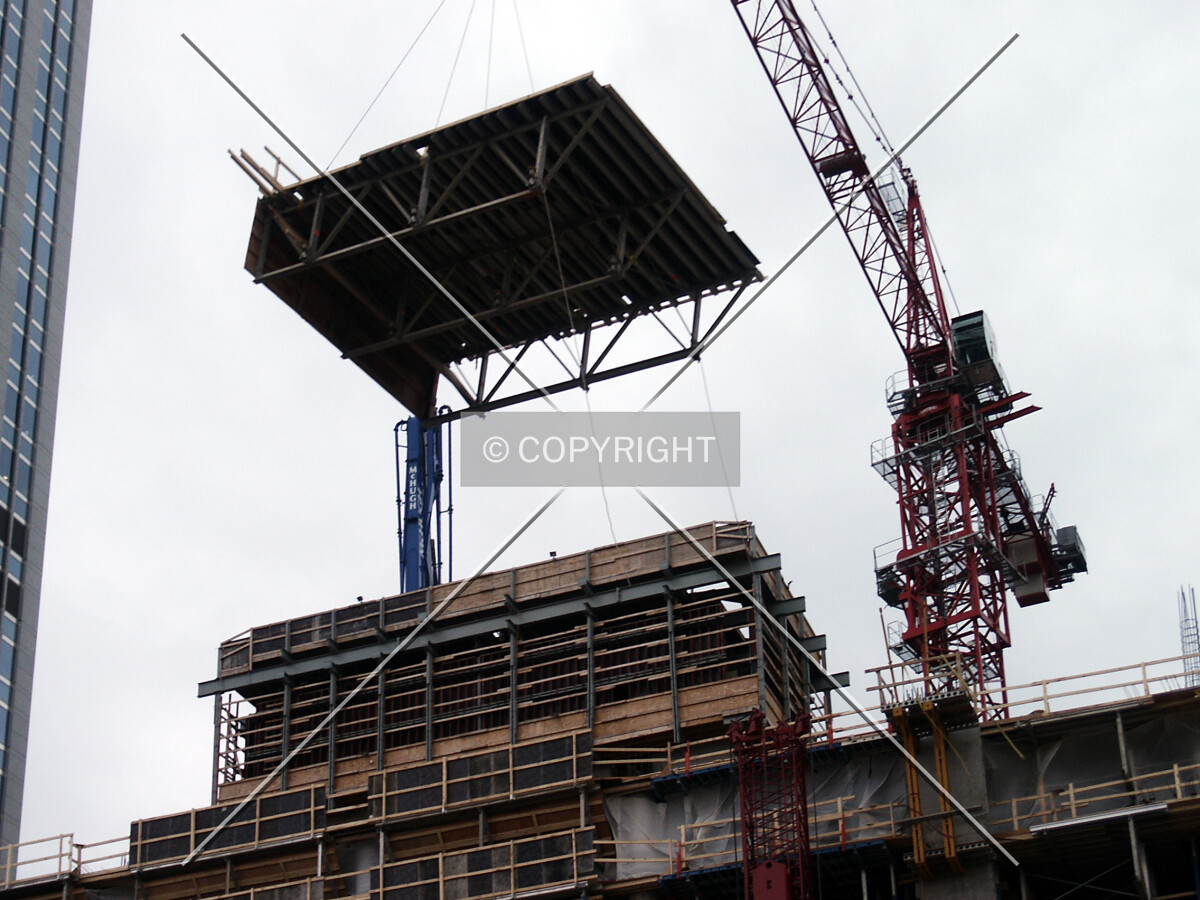 Movable platform being lifted over the core