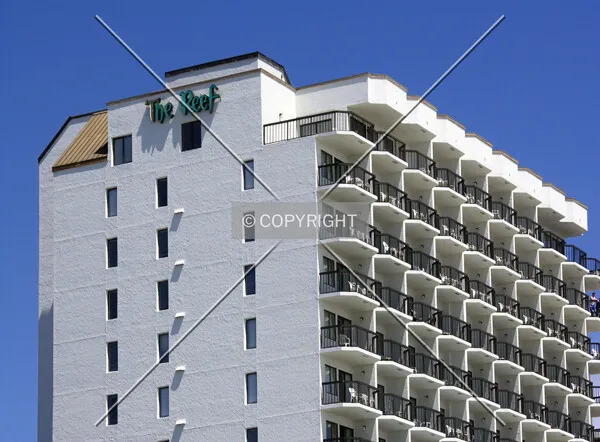 Upper floors and signage on the southern side