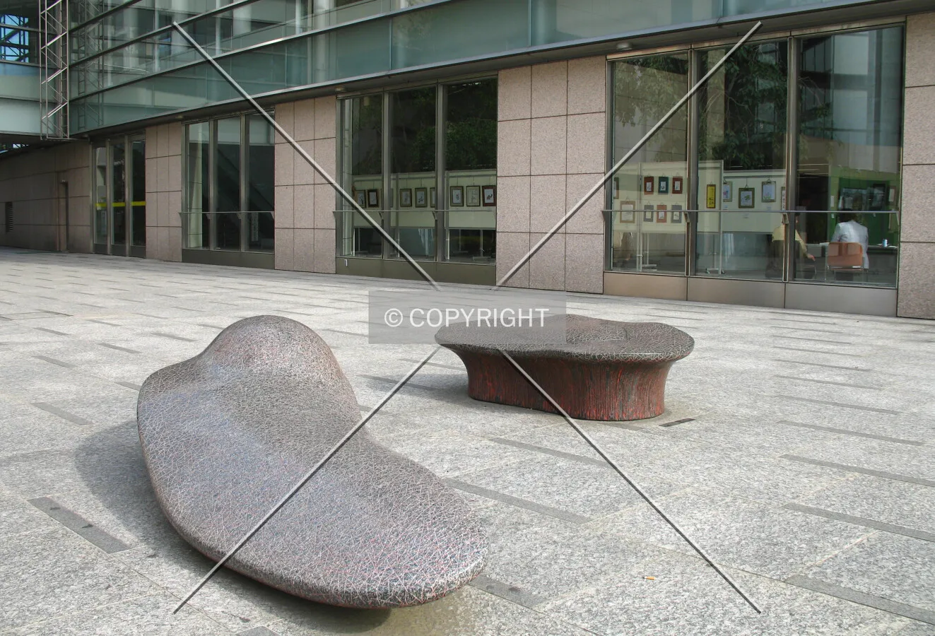 Sculpted benches near the front entrance
