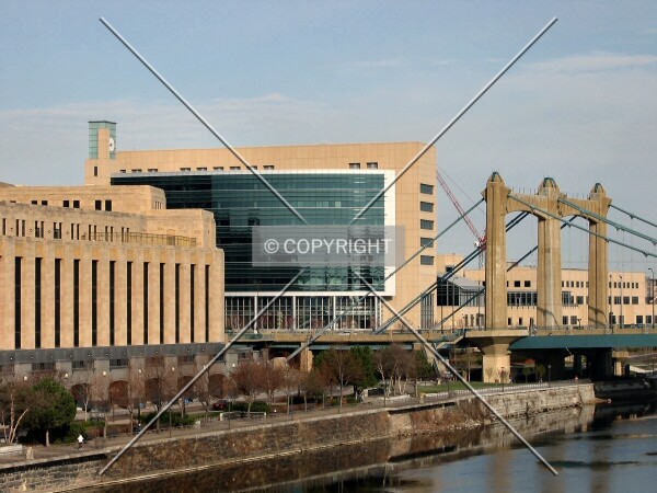 View to the west from the 3rd Avenue Bridge, framed by the Main Post Office and Hennepin Avenue Bridge