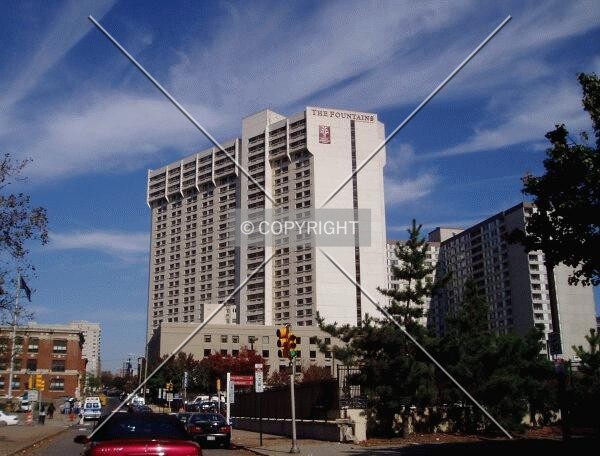 From the south on 18th St, with One Franklin Town (left) and Museum Towers (background)