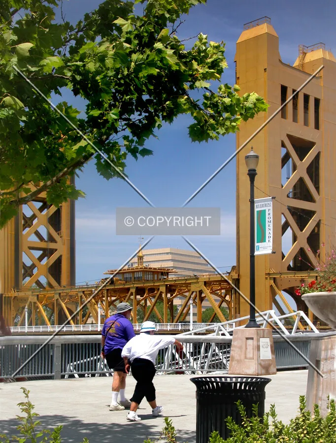 Bridge with the Zigguart of West Sacramento in the background and the River Promenade in foreground