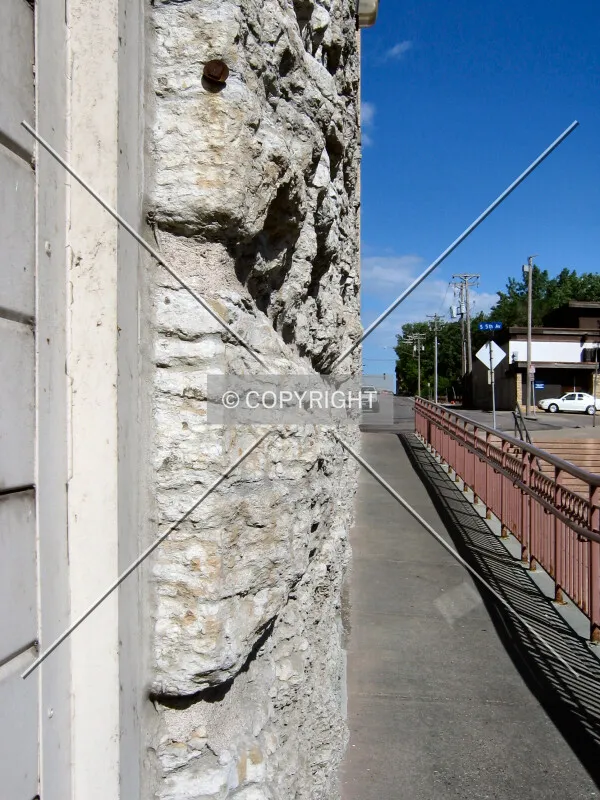 Rough stone on the north side of the base