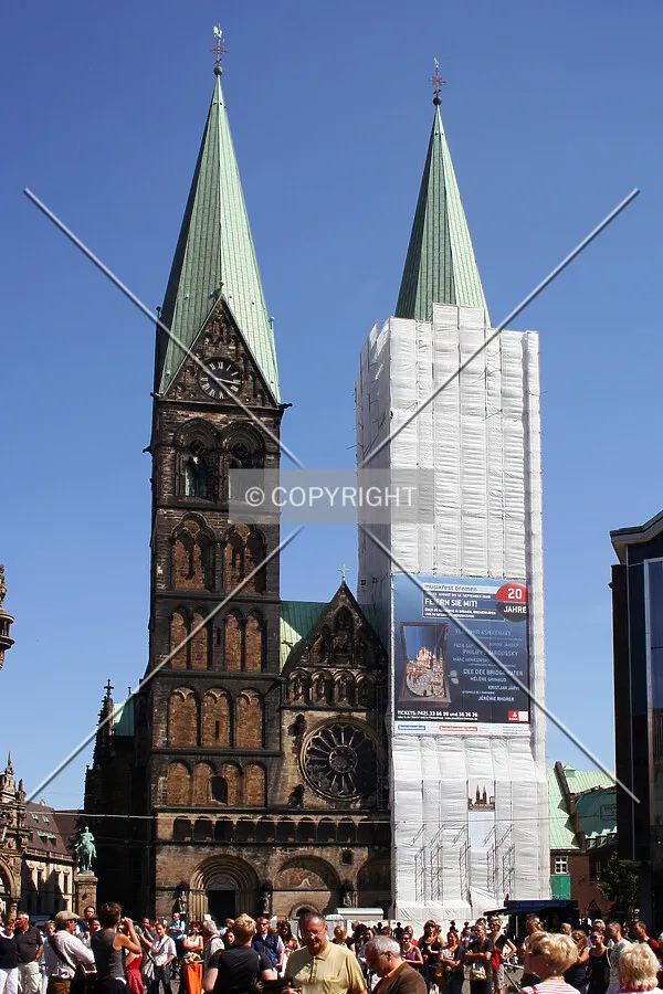 Front facade with the south tower under restoration