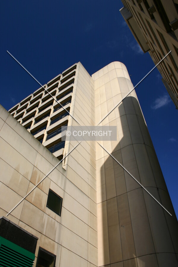Looking up at a small snatch of the rear from a neighbouring alley