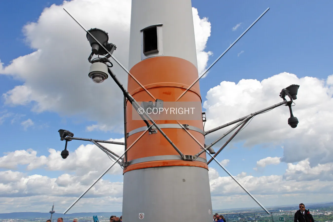 Lights which are illuminating the radio antenna at night