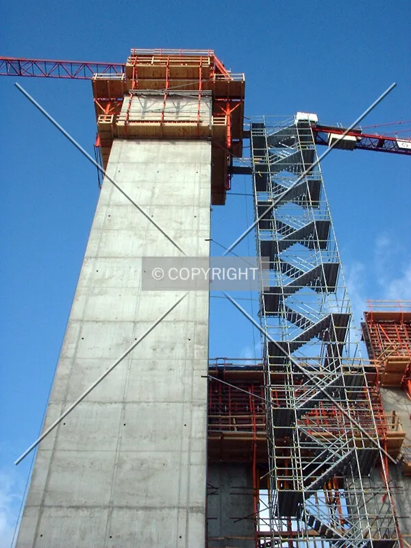Elevator core with temporary scaffold stairway