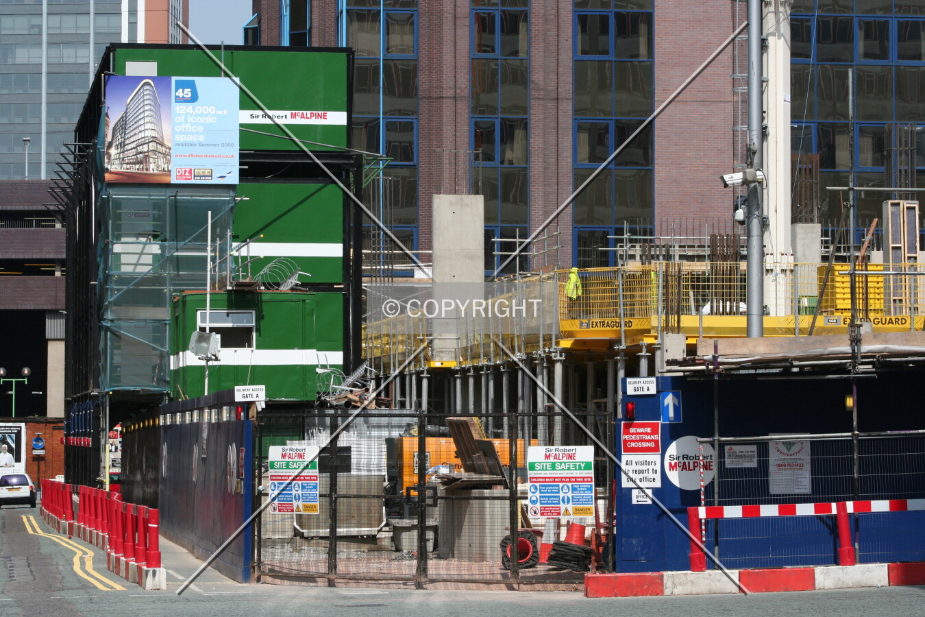 Looking at the contractors units, site entrance and construction progress