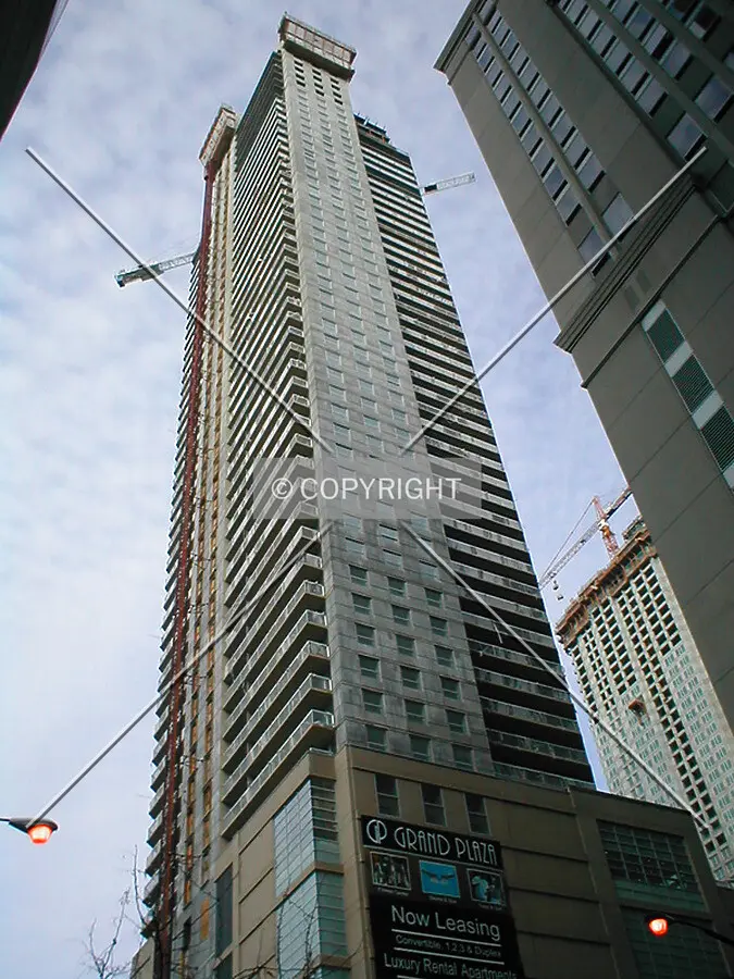 Exterior low angle elevation from Grand at State Street subway