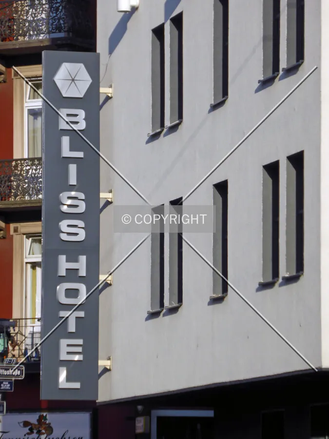 Bliss Hotel sign at the facade
